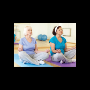 two women sitting on floor, meditating and relaxing in yoga class