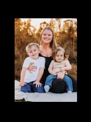 professional family photo young woman with two small children